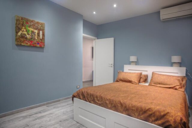letto-matrimoniale-casa-vacanze-appia-benny-urban-house